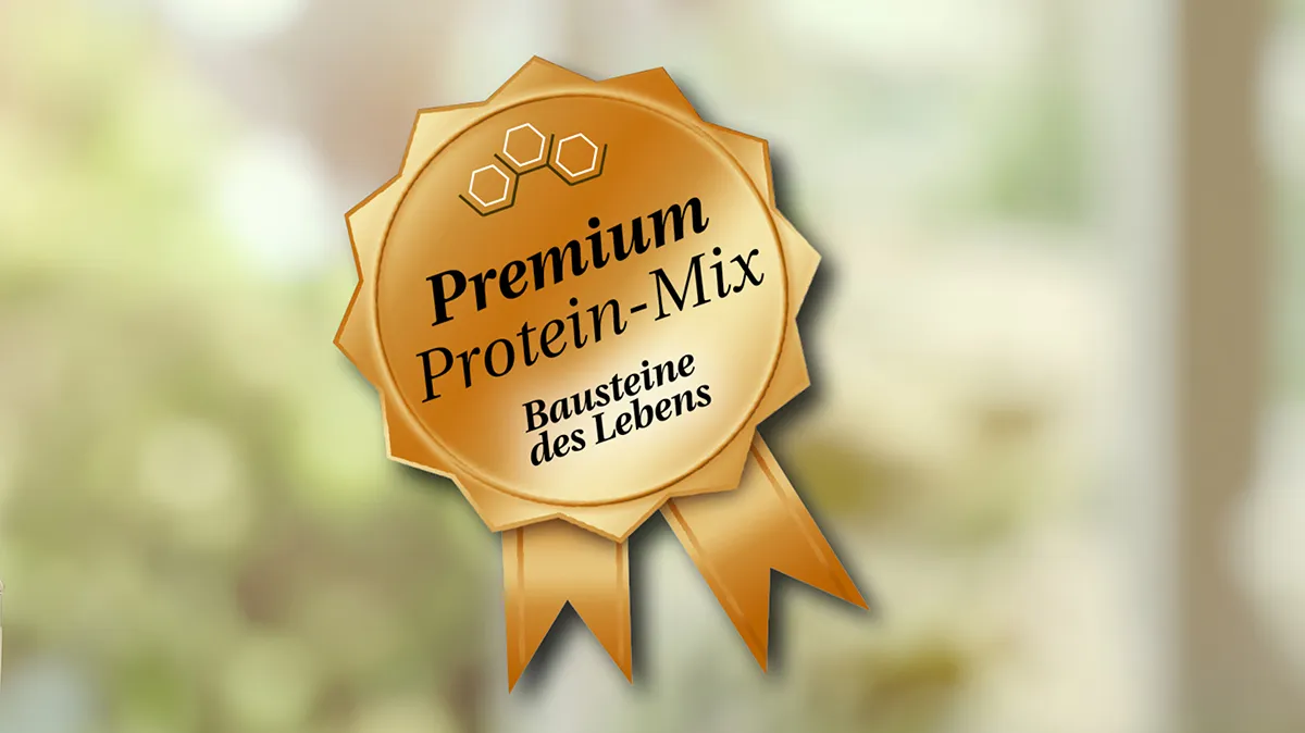 Goldenens Siegel mit Aufschrift Premium Protein-Mix – Bausteine des Lebens.