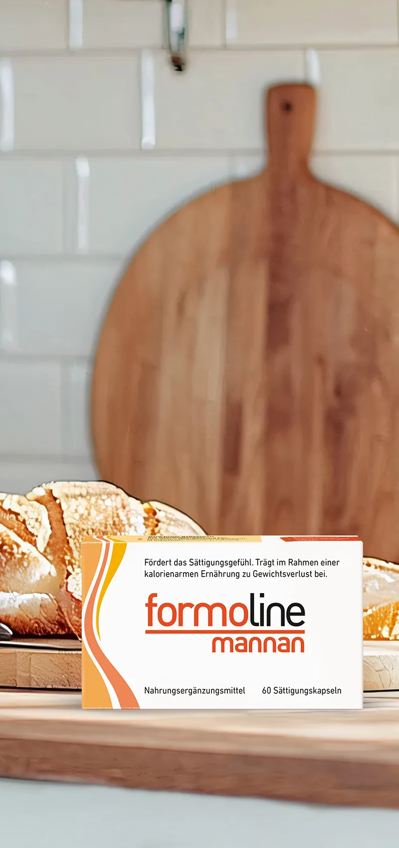 Packung formoline mannan steht neben Brot auf Küchentheke.